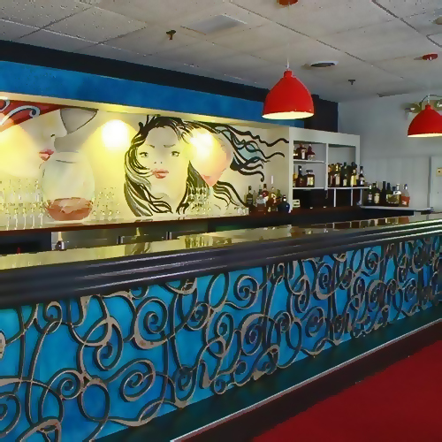 Bello Composite decorative panels on a blue bar front